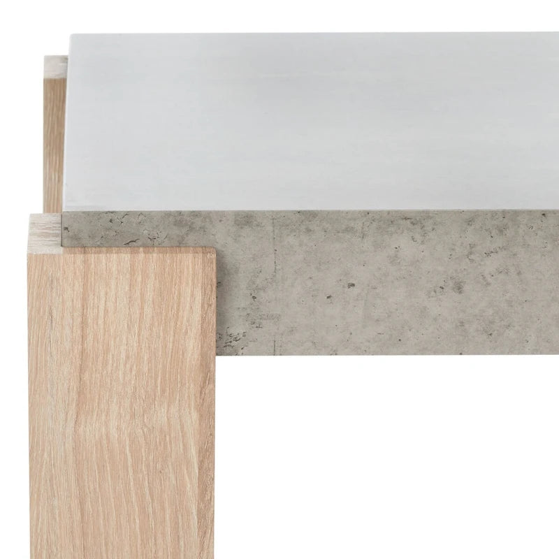 Table basse en faux béton avec pieds en forme de pilier